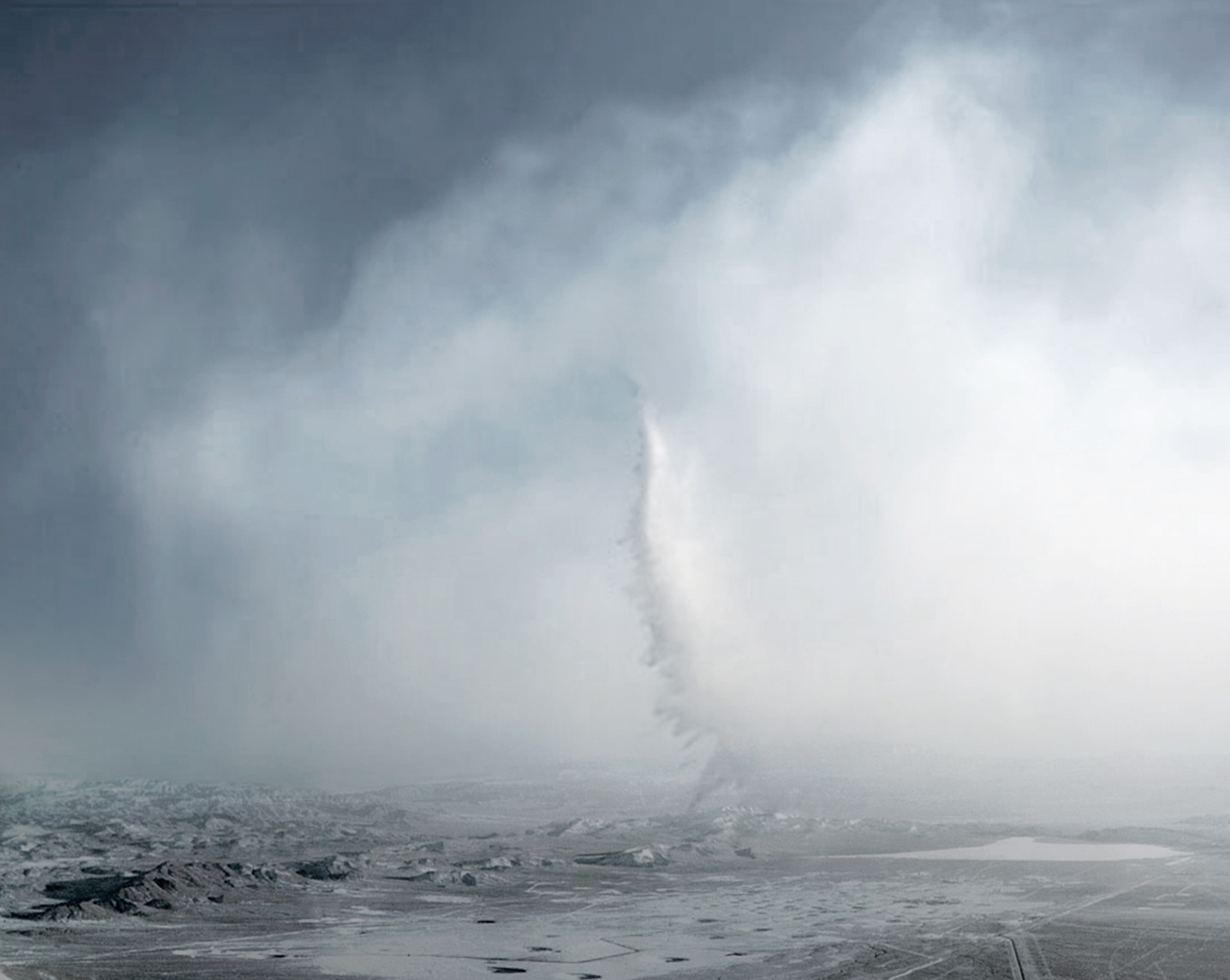 Oliver Wasow’s two thousand and ten artwork “Grey Trail.” It depicts a twister or tornado. 
