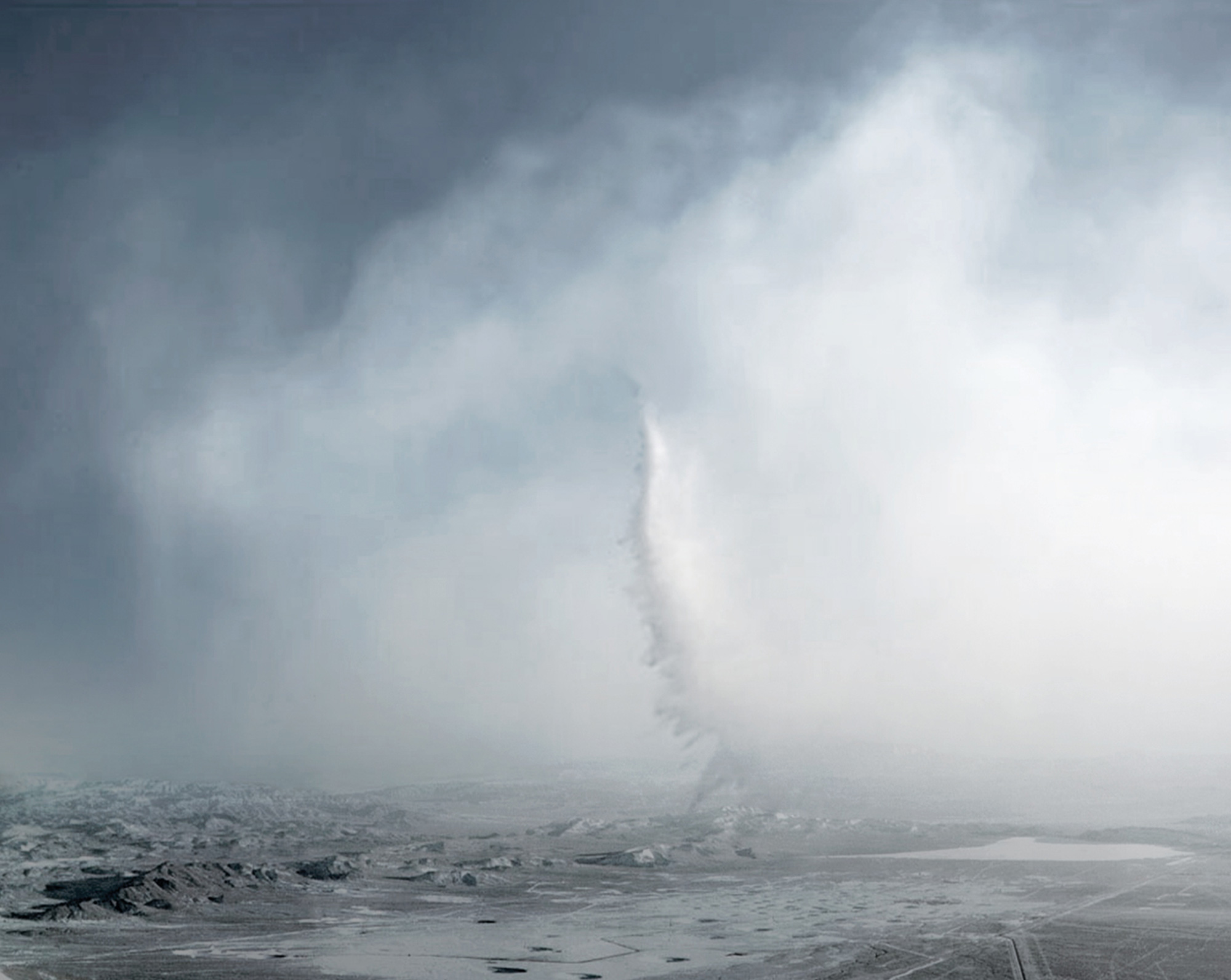 Oliver Wasow’s two thousand and ten artwork “Grey Trail.” It depicts a twister or tornado.