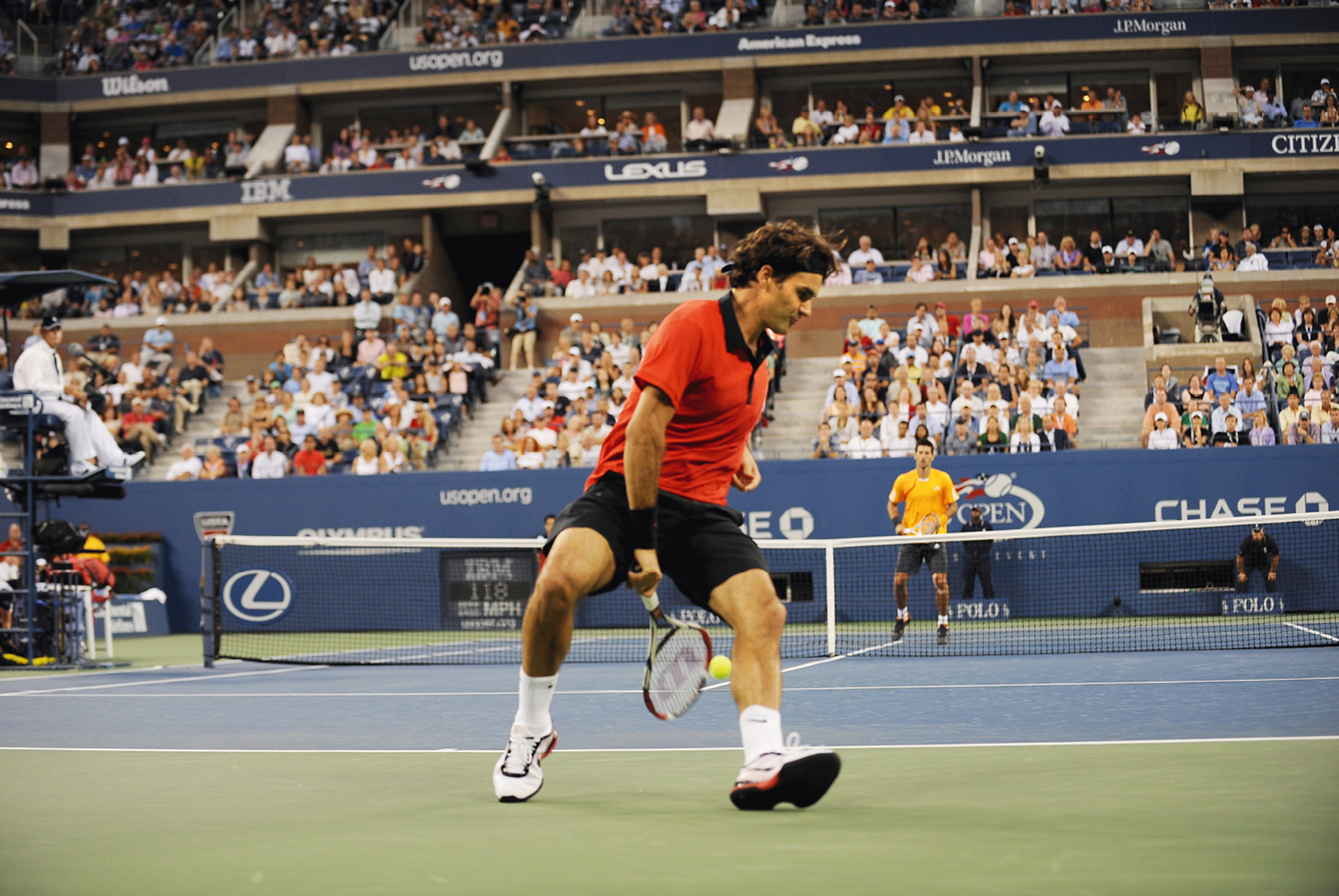 A photograph of Federer’s unorthodox groundstroke against Novak Djokovic at the two thousand and nine US Open.