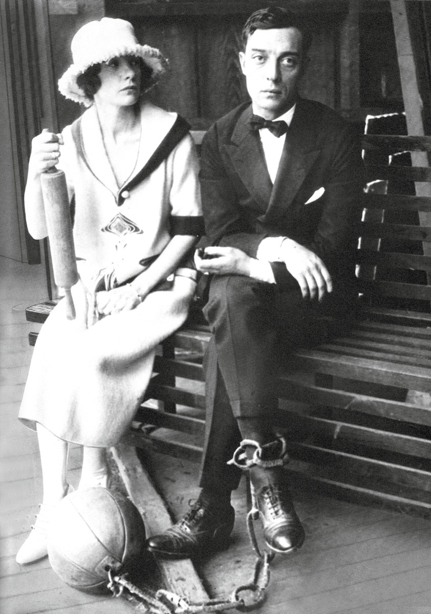 A photograph of Buster and Natalie a few weeks after their wedding, in which he wears a ball and chain.