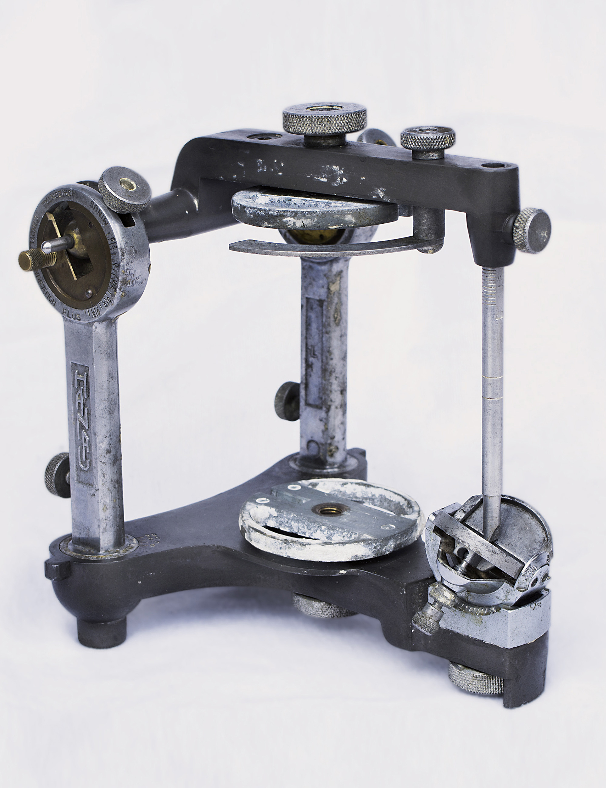 A photograph of an unidentified device comprised of metal poles and knobs.