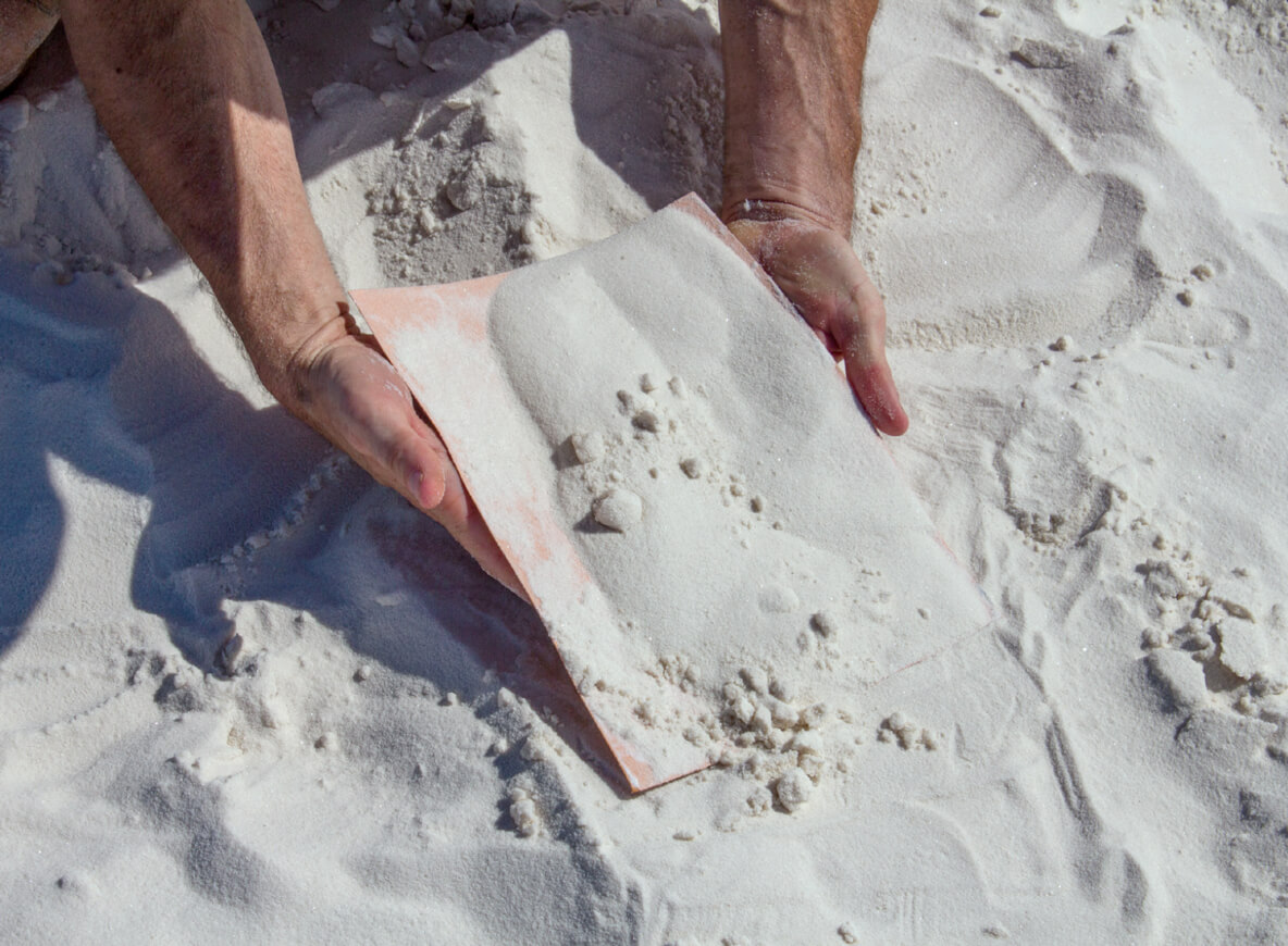 Collecting sand at White Sands, New Mexico. Photo Chris Domenick.