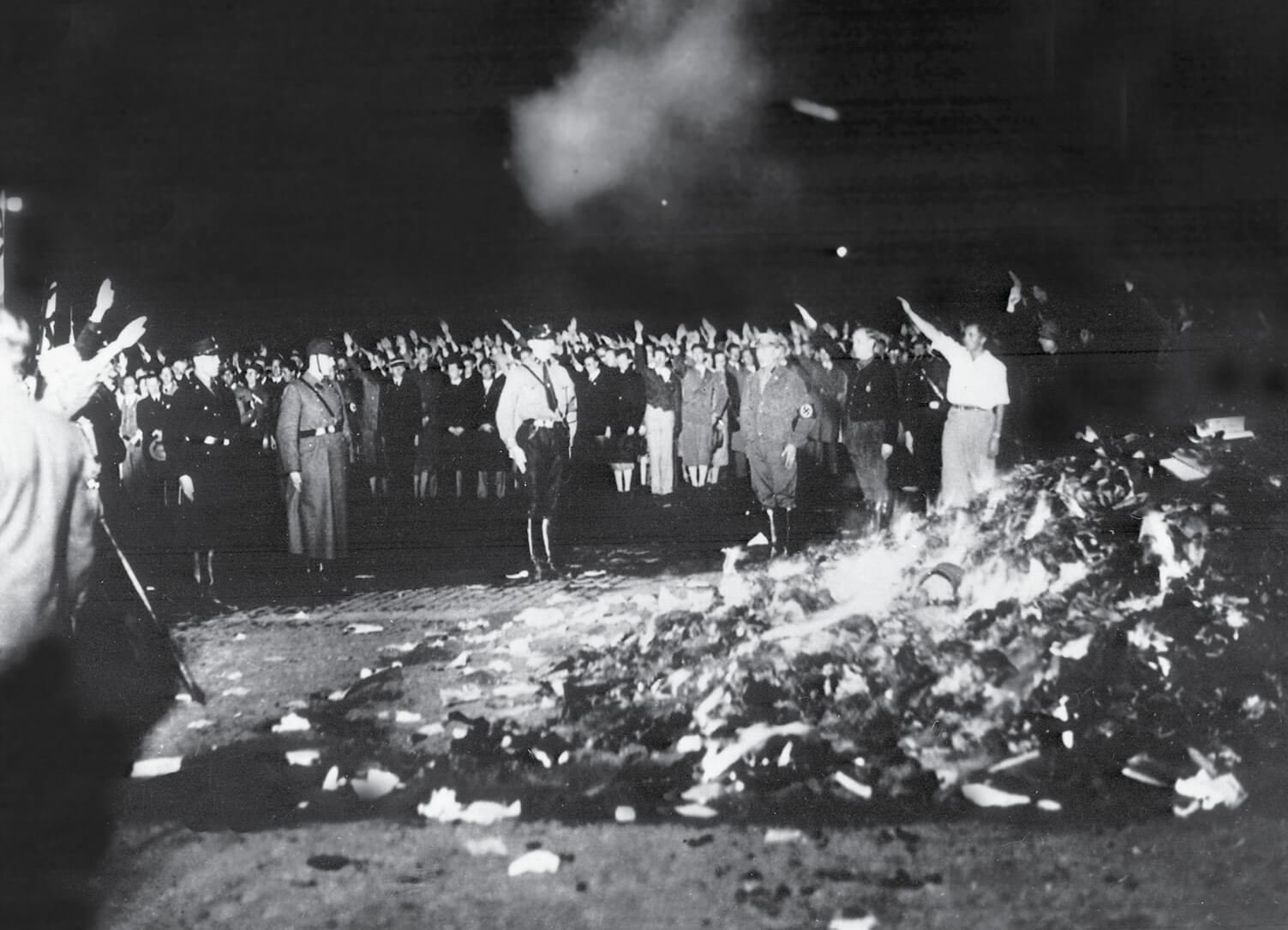 An image of a May tenth nineteen thirty two book burning organized by the Nazis at Berlin’s Opernplatz, now Bebelplatz.