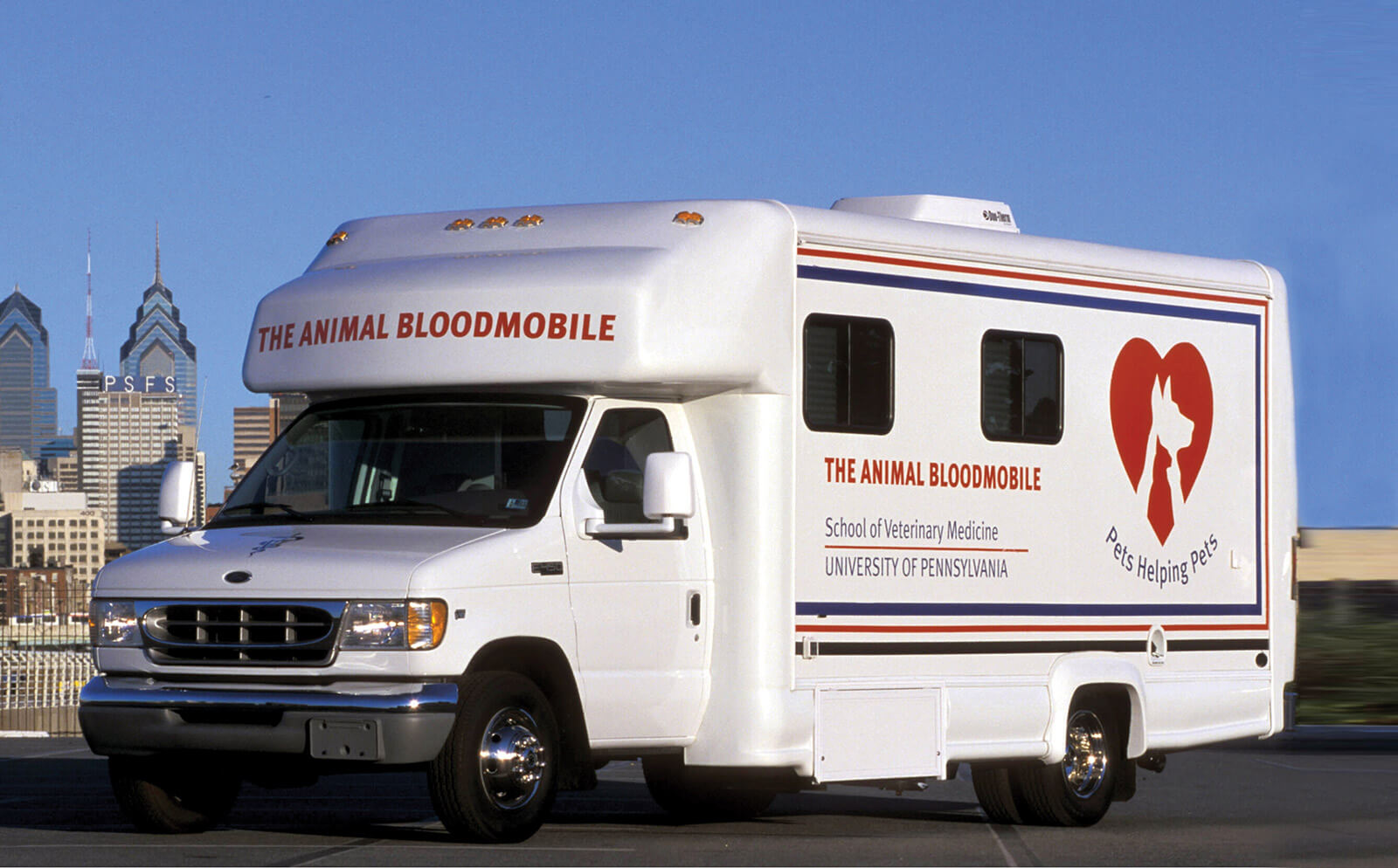 A photograph of “The Animal Bloodmobile,” a truck functioning as the only mobile service for canine blood banking in the country, operated by the veterinary school at the University of Pennsylvania.