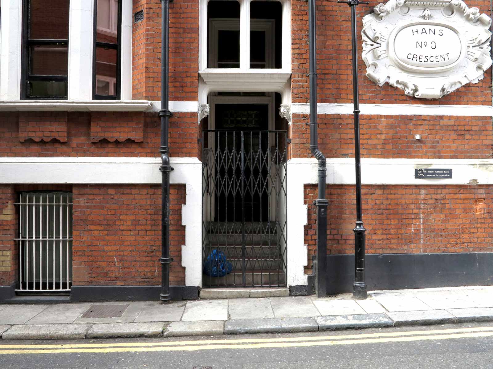 Photograph of the backdoor of an embassy.