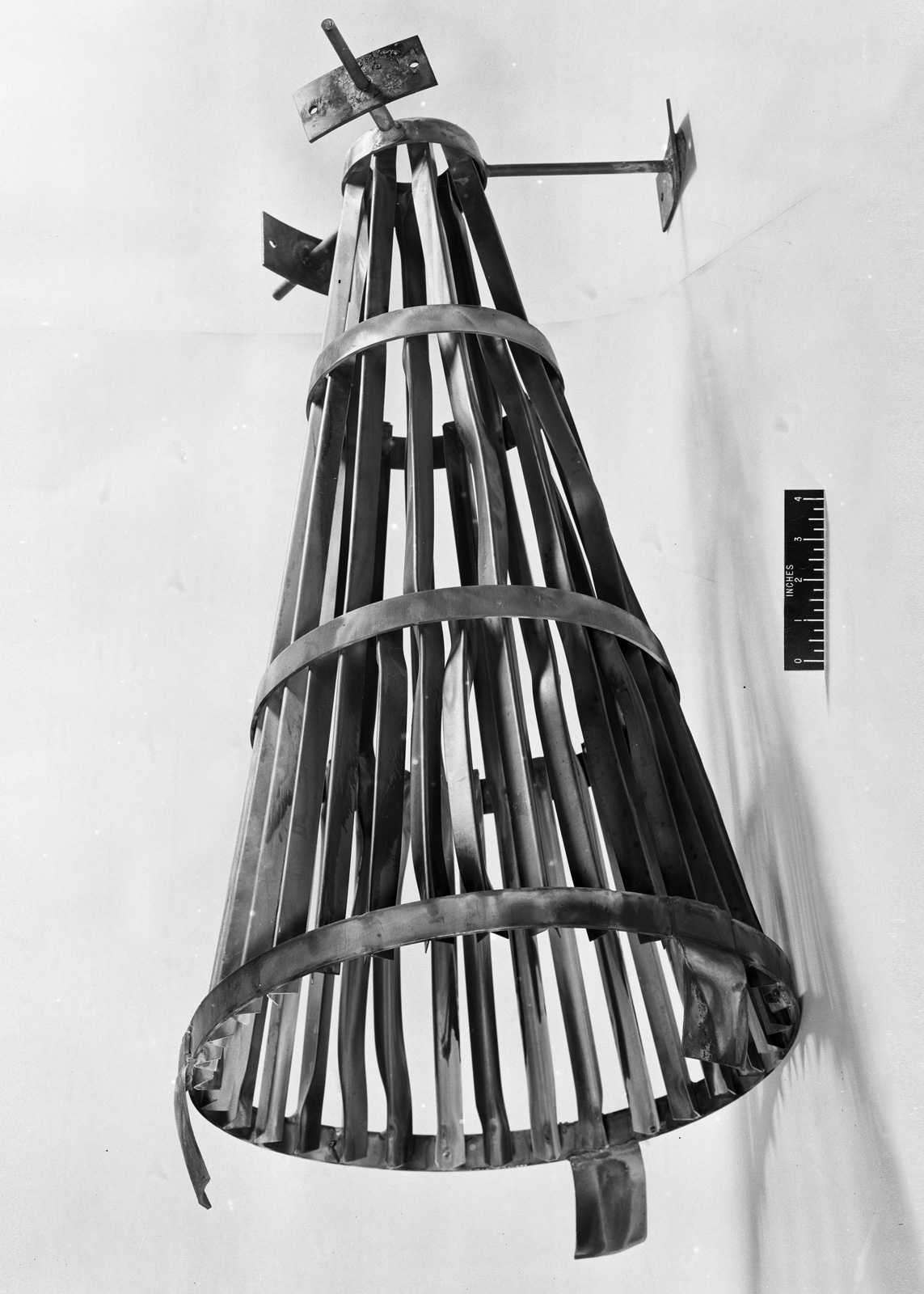 Photograph of an undated replica of Marcel Duchamp’s nineteen fourteen “bottle rack.”