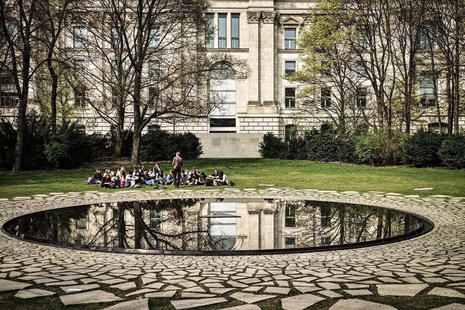 A circular pool. The Memorial to the Sinti and Roma of Europe Murdered under National Socialism in the Tiergarten in Berlin.