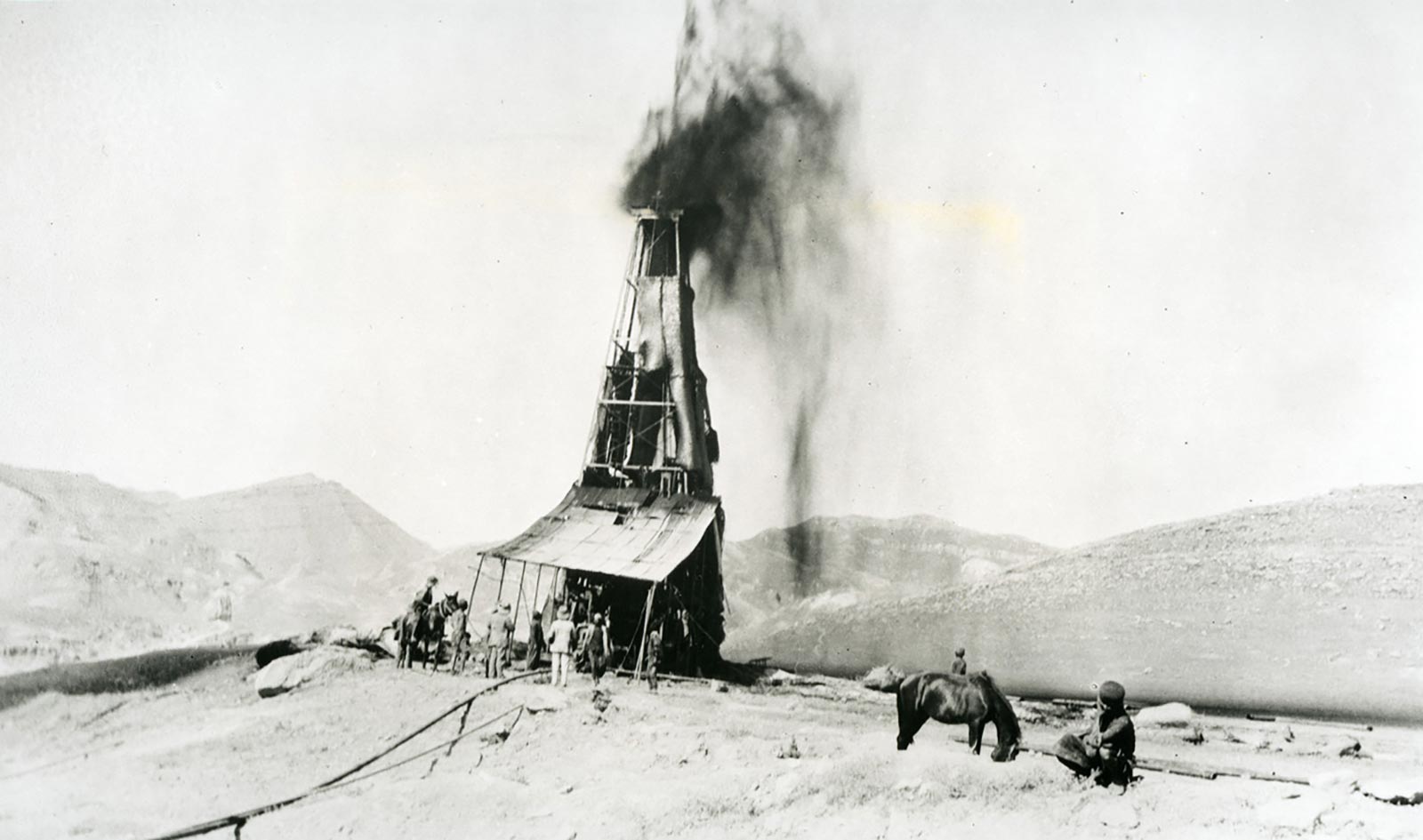 A photograph of the first Anglo-Persian Oil Company well to strike oil in Iran. Built outside Masjid Suleiman, a town just to the west of the Zagros Mountains, the well struck oil on the morning of twenty-six May nineteen oh eight.