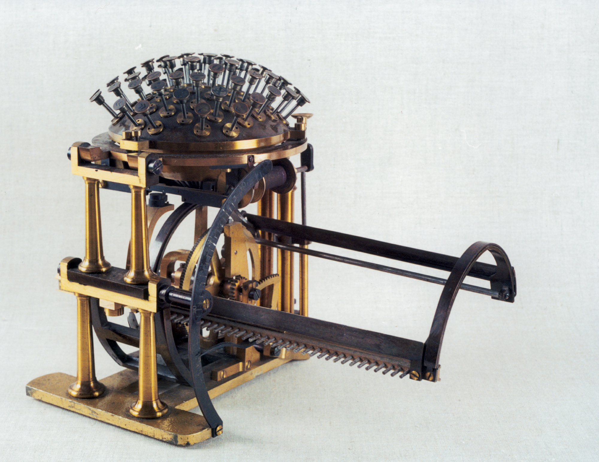 A photograph of Nietzsche's typewriter, an 1867 Malling Hansen Writing Ball.