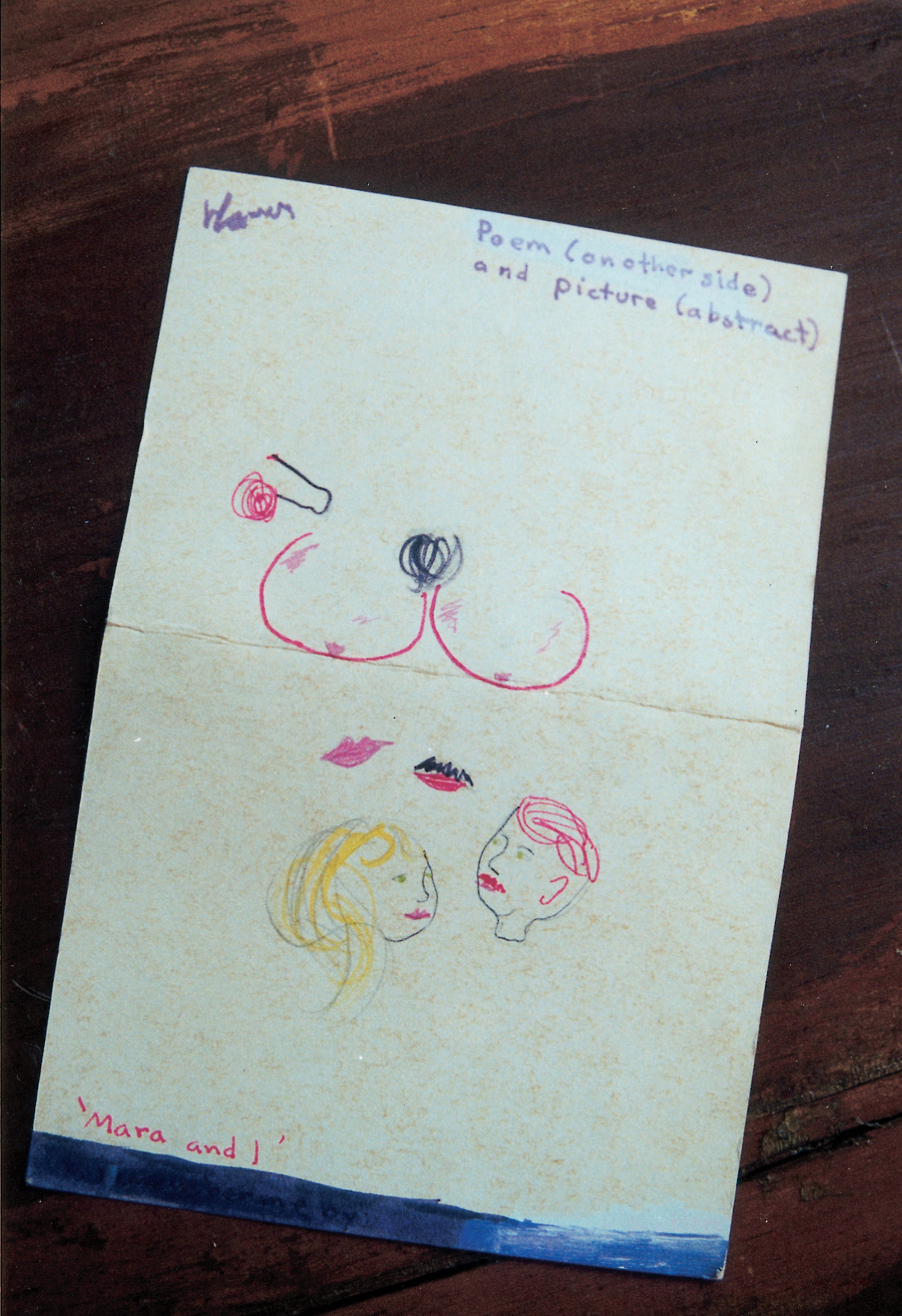 A photograph depicting a piece of card with drawings on it. The caption reads: Poem printed in pencil (verse) and red magic marker (chorus) on inside of folded index card and signed by Harvey in pencil. On the other side of the card is a vivid semi-abstract mixed-media drawing (pencil, magic marker and white-out) with distinct sexual overtones, signed in purple marker by Harvey and with the title, “Mara and I” printed on it in red marker, as well as a redundant legend in purple identifying this as a “picture (abstract)”. The poem is a stellar example of that combination of sentimentality and ribaldry so characteristic of Harvey. Displaying his gift for drawing as well as poesy, and signed on both sides, this may be the most precious item in the collection.
Ah... Mara...
to feel you, warm and yielding
against my strong chest,
is bliss
Ah... Mara...
The glorious oneness I feel
with your innocent lips
upon mine, which I never
feel otherwise, (except when
it’s Melanie’s, Dawn’s, Philisses, anne’s [sic] or Jenny’s lips)
Ah... Mara...
to feel warm and peaceful,
after fucking long & vigorously
with you,
is an experience I will never
forget
Ah... Mara... My fair queen
of love...
I adore you.

